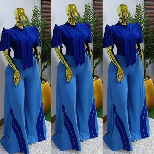 Women’s elegant two-piece pants set with puff sleeve top and wide-leg colorblock trousers for sophisticated style