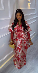 Amina Luxe Brocade Gown in red and gold floral fabric with pleated waist and puff sleeves