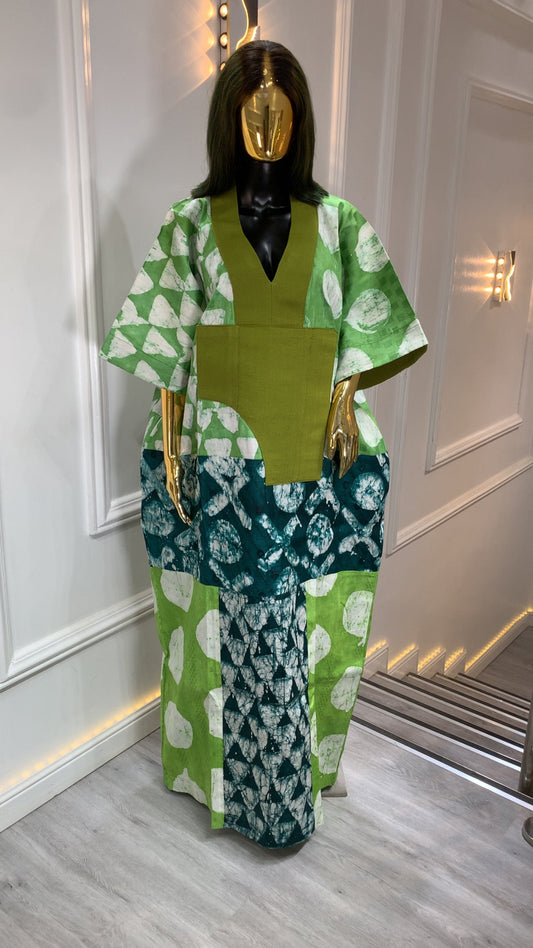 Luxury Adire long dress for women with traditional handmade African tie-dye design and flowing maxi silhouette