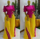 Women’s elegant two-piece pants set with puff sleeve top and wide-leg colorblock trousers