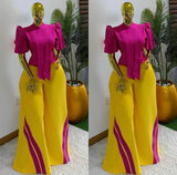 Women’s elegant two-piece pants set with puff sleeve top and wide-leg colorblock trousers in breathable fabric